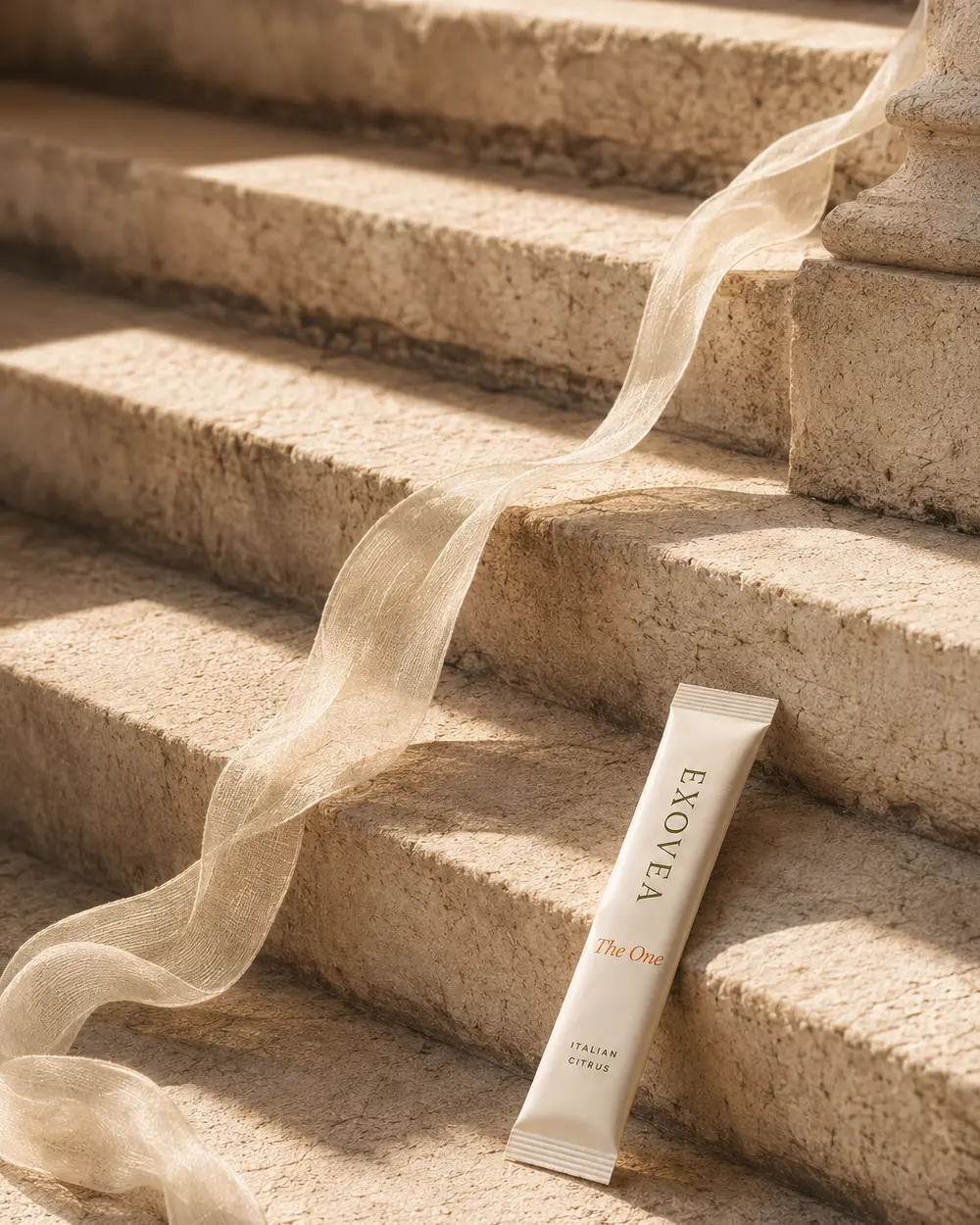 EXOVEA The One sachet framed by rhythmic Mediterranean light